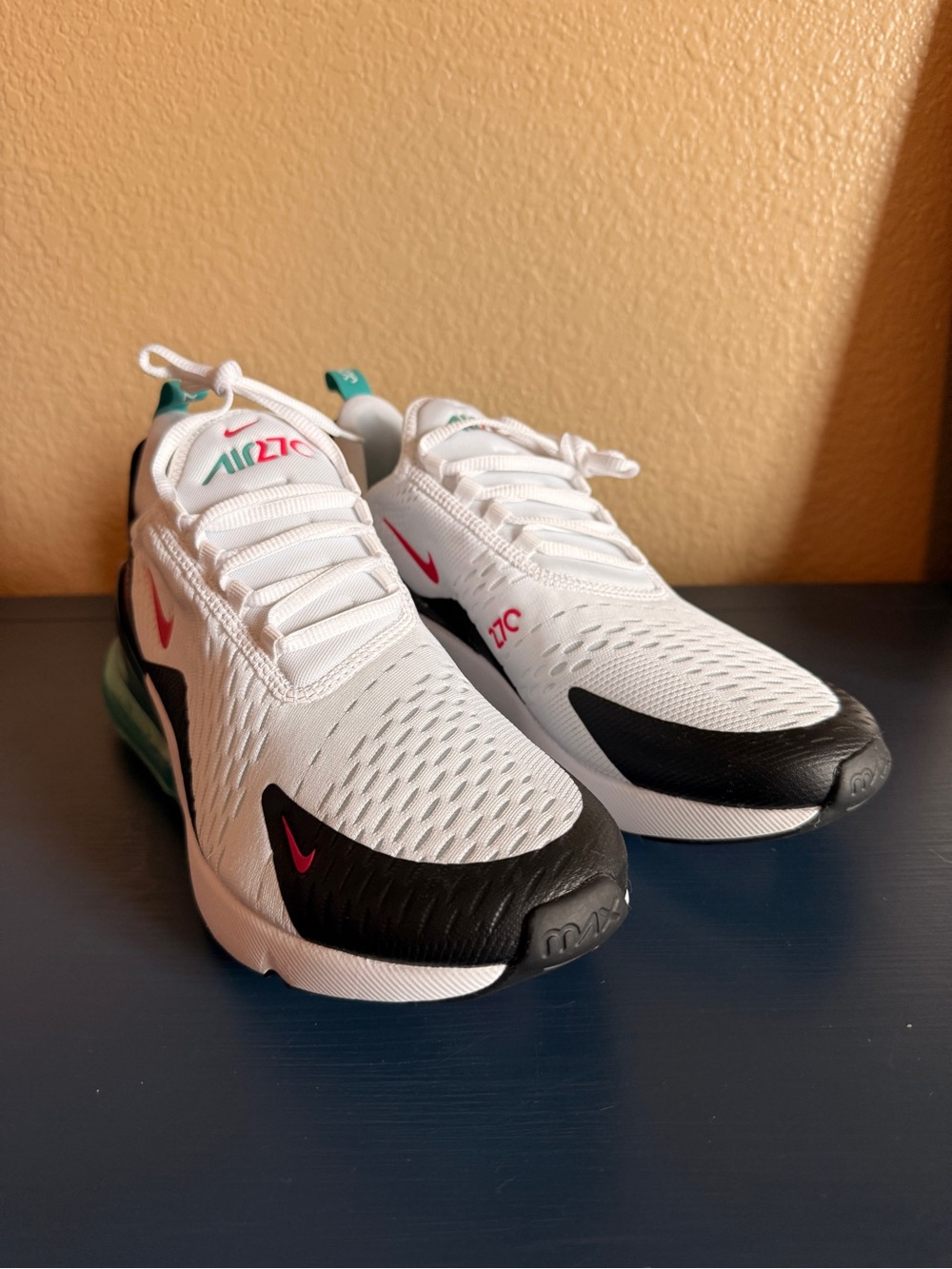 Nike Men’s White/Black Athletic Sneakers with Pink and Green Accents